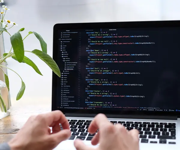 About development process with coding and technology icons on a blue background